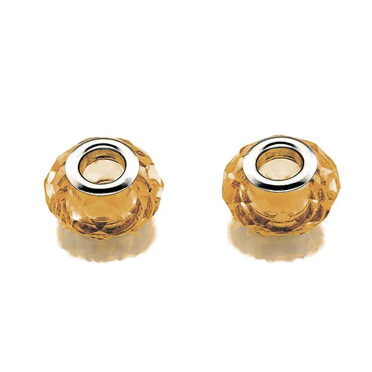 Paire de perles de verre brun